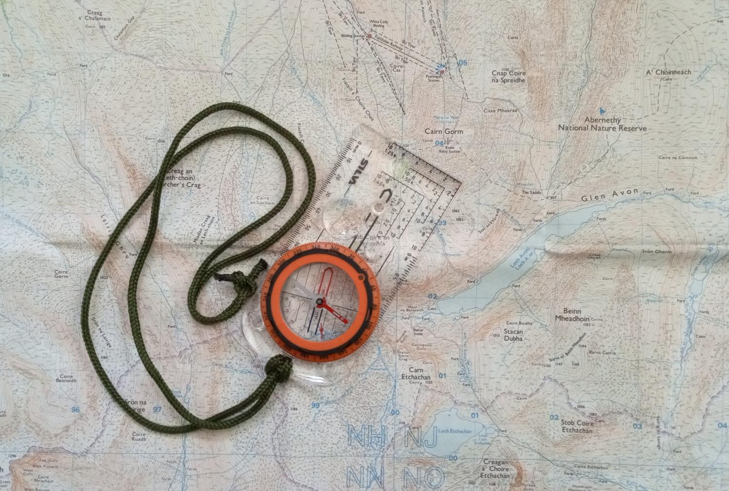 A map and a compass are essential for your adventure in the Scottish Highlands